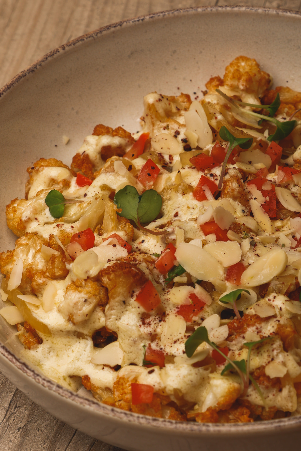 Roasted cauliflower with almonds and microgreens at Nōesis