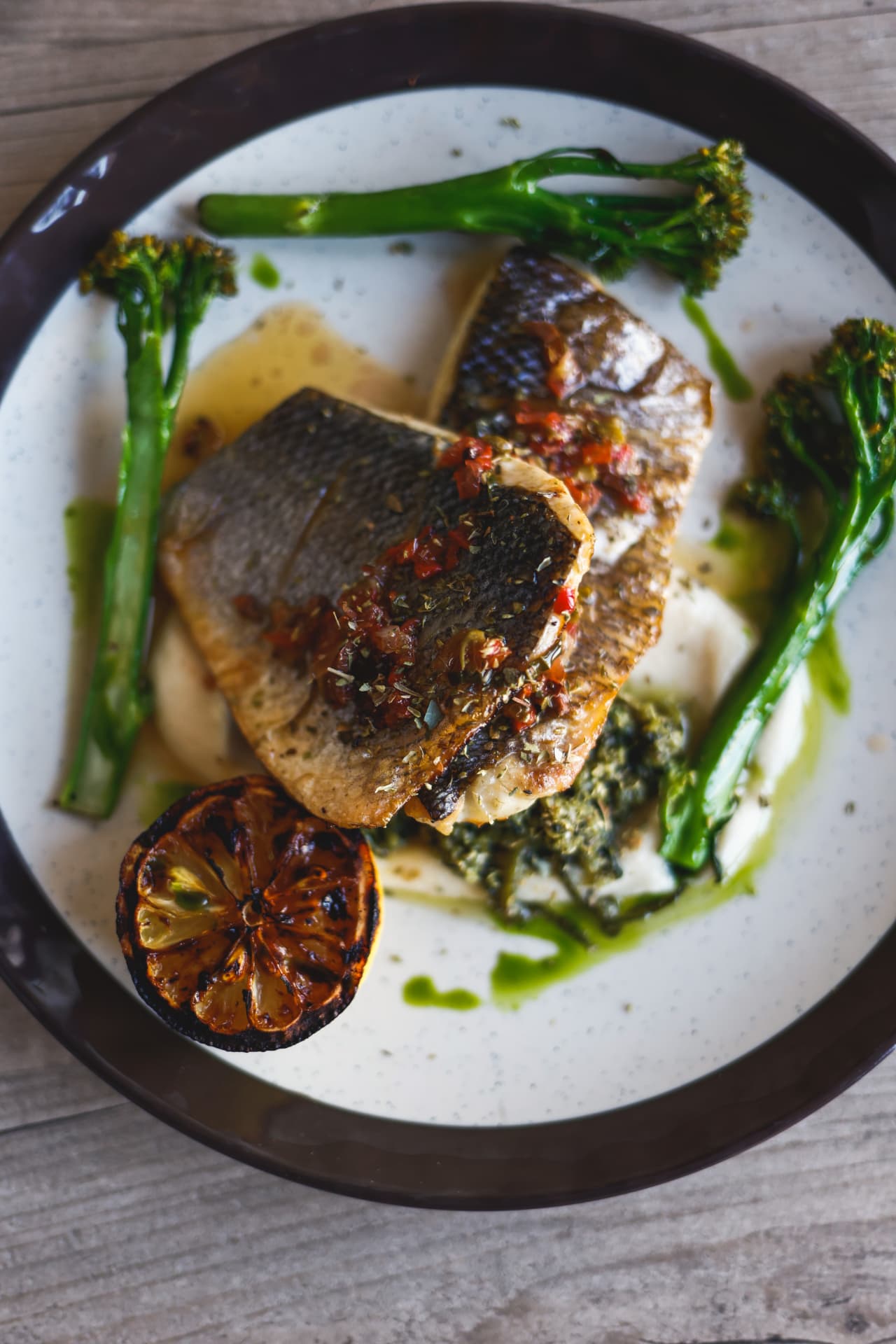 Fish with grilled lemon and greens at Nōesis